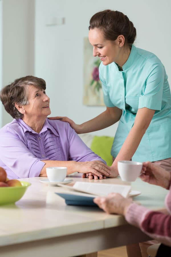 healthcare professional caring for lady